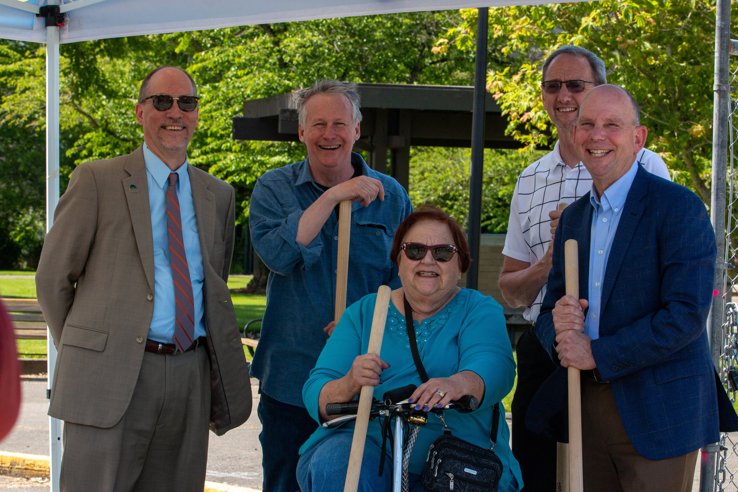 Centralia College President Bob Mohrbacher, Board of Trustees members Court Stanley, Doris Wood-Brumsickle and Mark Scheibmeir and Athletic Director Bob Peters pose for a photo during the groundbreaking ceremony for the athletic field Wednesday.